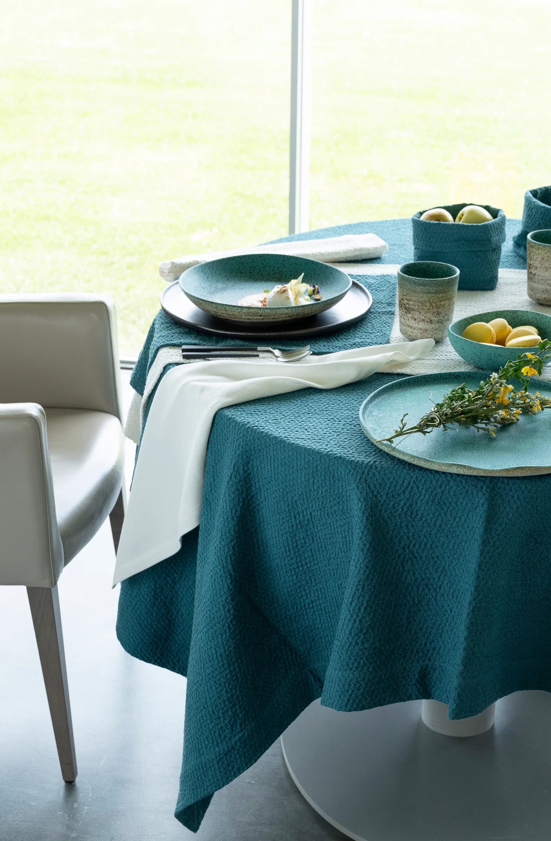 A stack of fine bone china plates with intricate designs.